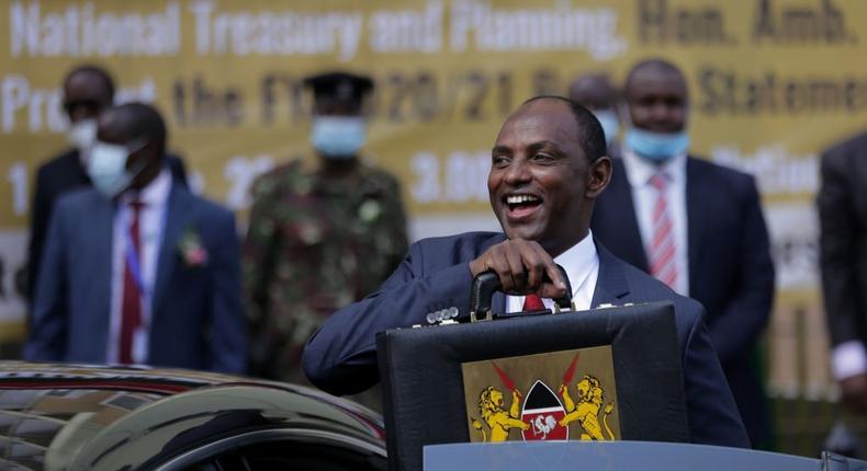 NAIROBI, NAIROBI COUNTY, KENYA - 2020/06/11: Kenyas National Treasury and Planning Cabinet Secretary, Ukur Yatani with the budget briefcase before leaving to Parliament for budget reading 2020/2021. (Photo by Billy Mutai/SOPA Images/LightRocket via Getty Images)