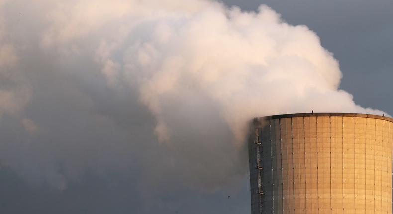Smoke billows from a chimney at a combined-cycle gas turbine power plant in Drogenbos.
