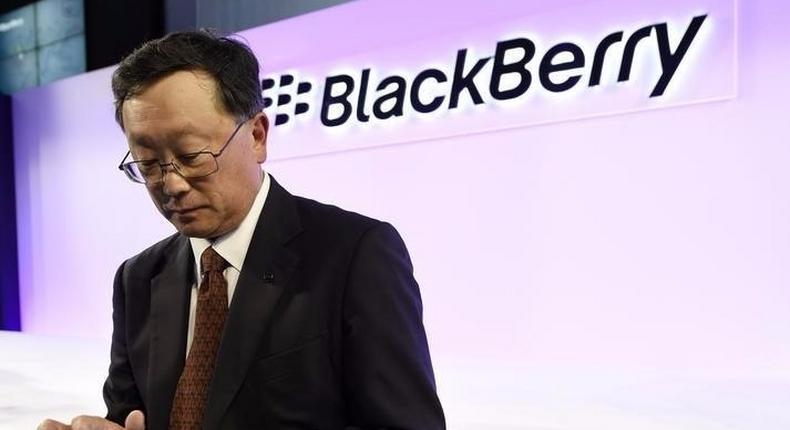 BlackBerry Chief Executive John Chen uses a Passport smartphone following the official launch event in Toronto