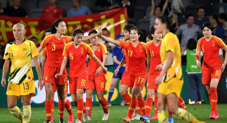 China's players celebrate scoring against Australia during the women's Olympic football tournament in Sydney in February last year. Now more than a year later they have the chance to complete their quest for an Olympic place when they face South Korea