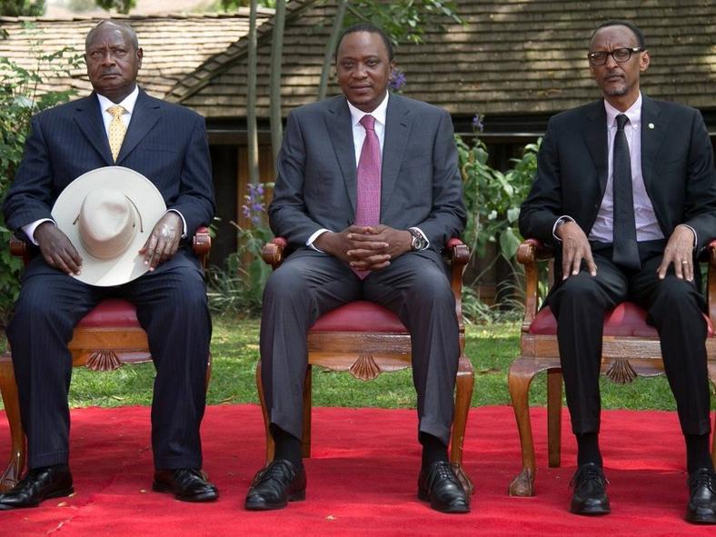 Presidents Yoweri Museveni, Uhuru Kenyatta and Paul Kagame pose for a photo 