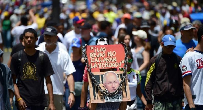 Opposition activists protest in Caracas, but turnout is down as many opposed to President Nicolas Maduro grow discouraged