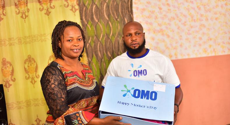 OMO celebrates a mother during the Mother's Day celebration in Abuja