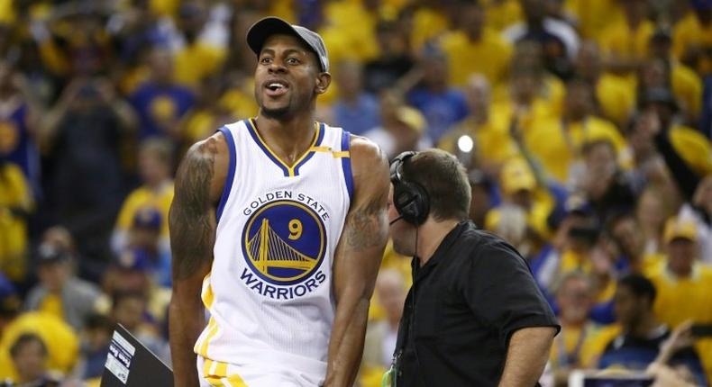 Andre Iguodala, pictured in June 2017, just signed a deal to stay with the Golden State Warriors for three years, in an effort by team management to maintain their core club