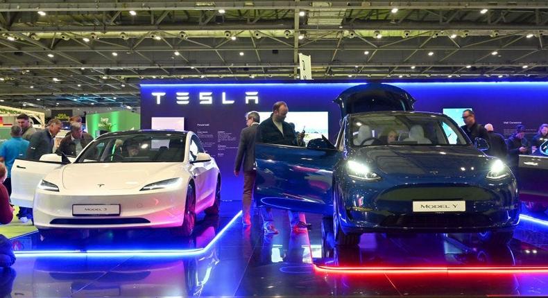 Tesla Model 3 and Model Y on display at the Everything Electric London 2024 show.John Keeble/Getty Images