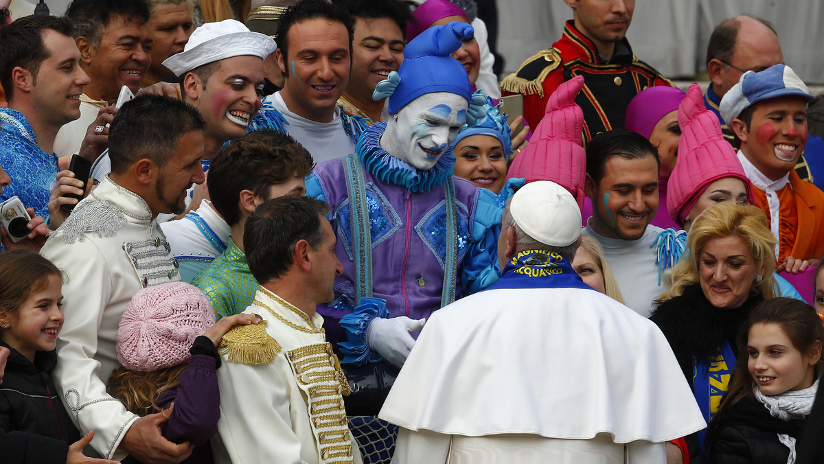 Pope Francis meets the members of aquatic circus at the end of his weekly audience in Saint Peter's Square at the Vatican