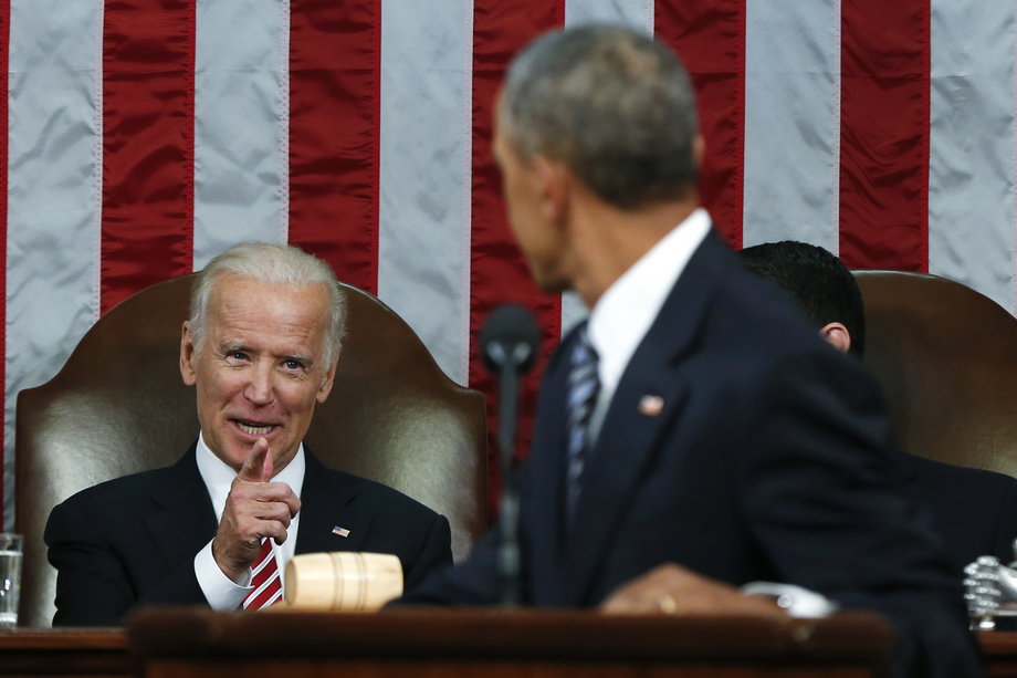 Biden points to Obama while Obama delivered his final State of the Union address on January 12, 2016.