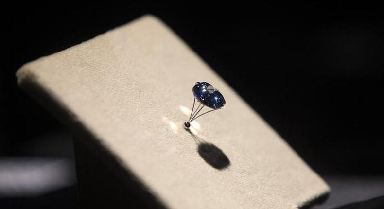 A 12-carat Blue Moon Diamond is pictured while on display at the Natural History Museum of Los Angeles County in Los Angeles, California September 12, 2014. REUTERS/Mario Anzuoni