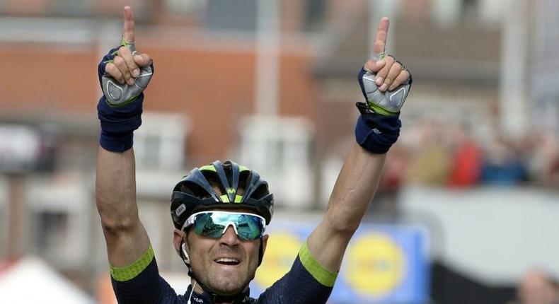Alejandro Valverde celebrates as he crosses the finish line to win the 102nd edition of the Liege-Bastogne-Liege cycling race on April 23, 2017