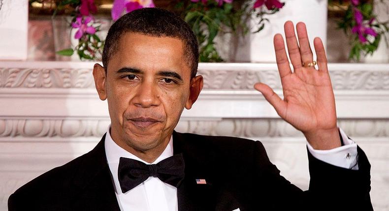 Obama in his typical notch lapel tuxedo.