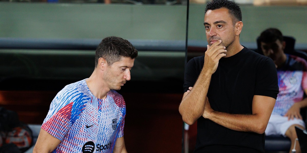 Robert Lewandowski i Xavi.