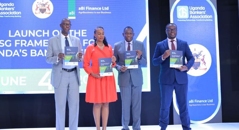 L-R: UBA Executive Director, Wilbrod Owor, Mona Muguma Ssebuliba from aBi Finance, BOU Deputy Governor, Michael Atingi-Ego and Julius Kakeeto, the UBA Chairman at the launch of the ESG framework