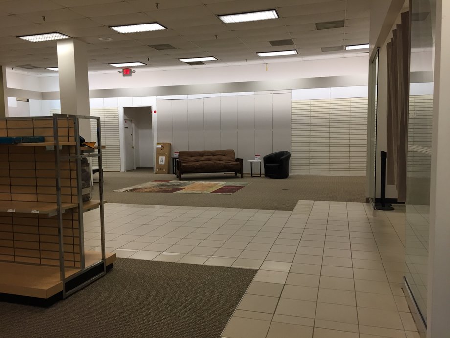 An empty are of a Sears store in Richmond, Virginia, showcases Sears' problems with declining inventory.