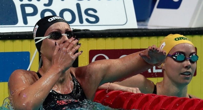 Italy's Federica Pellegrini celebrates after winning the women's 200m freestyle final during the swimming competition at the 2017 FINA World Championships in Budapest, on July 26, 2017