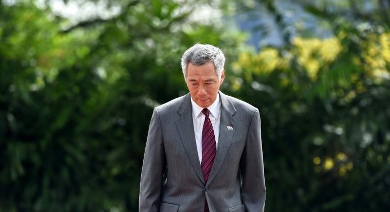 Singapore Prime Minister Lee Hsien Loong stands at an event at the Istana presidential palace in Singapore