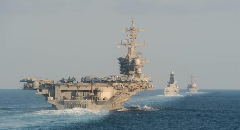 The aircraft carrier USS Abraham Lincoln and its strike group travelled through the Strait of Hormuz this week, a first for a US carrier since April