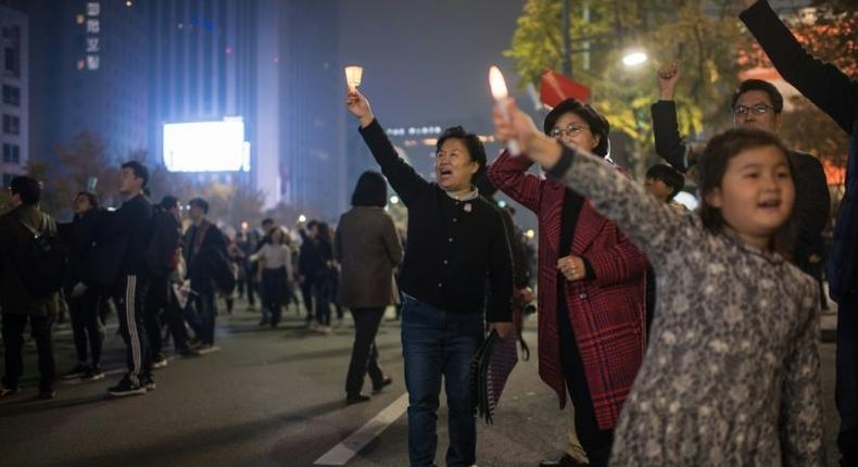 Demonstrators gather during a protest calling for the resignation of South Korean President Park Geun-Hye, at Gwanghwamun square in Seoul, on November 5, 2016