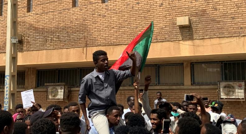 Hundreds of Sudanese university students rallied in downtown Khartoum Tuesday seeking justice for fellow pupils killed in months of political unrest