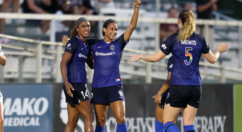 Jessica McDonald, left, is one of many professional female soccer players who juggled odd jobs to make the ends meet.
