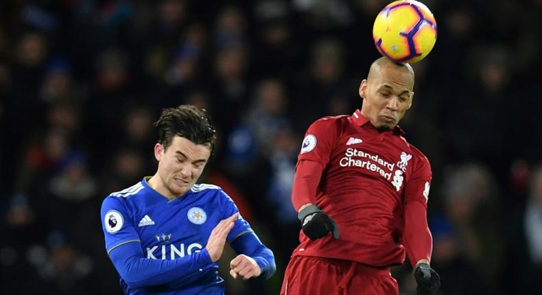 Injuries and suspensions have forced Jurgen Klopp to start Fabinho (right) in Liverpool's defence against Bayern Munich on Tuesday