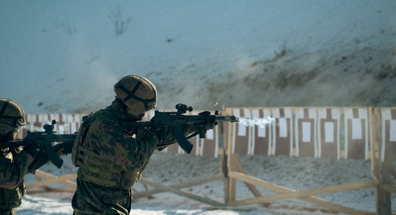 Finnish reservists of the Guard Jaeger Regiment stand at a shooting range as they take part in a military exercise at the Santahamina military base in Helsinki, Finland on March 7, 2023.Alessandro Rampazzo/AFP/Getty Images