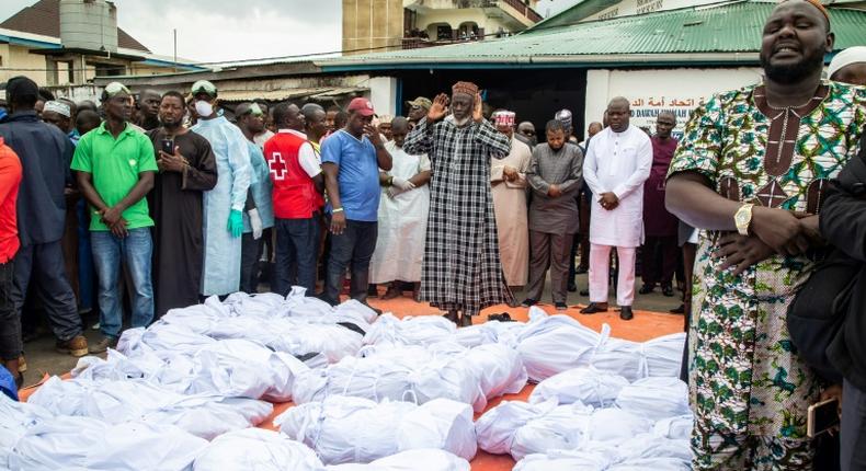 Only eight of the 36 people inside the building survived when the fire broke out in the early hours of Thursday morning as the victims, who were all of Guinean origin, slept in the school dormitory