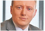 Paweł Dziekoński, dyrektor w dziale zarządzania ryzykiem firmy doradczej Deloitte