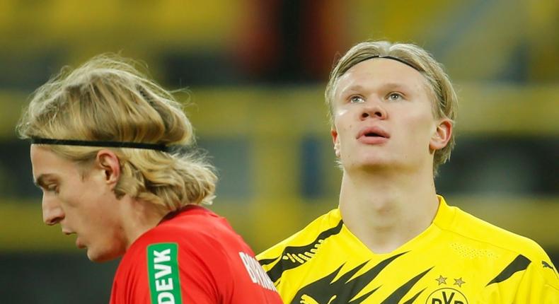 Borussia Dortmund striker Erling Braut Haaland (R) was ruled out of Wednesday's home match against Lazio