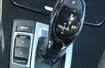 BMW 650i Gran Coupe – obok lewarka automatu przyciski do sterowania twardością zawieszenia