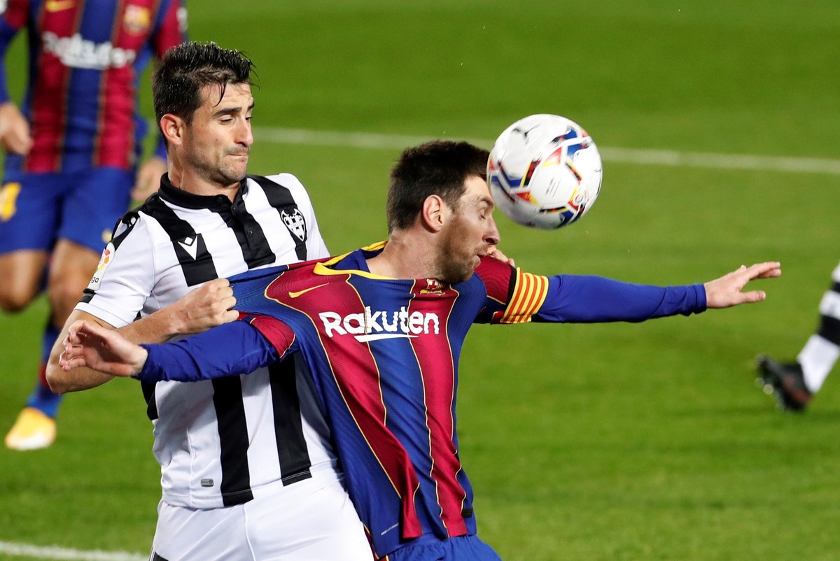 Lionel Messi i Sergio Postigo