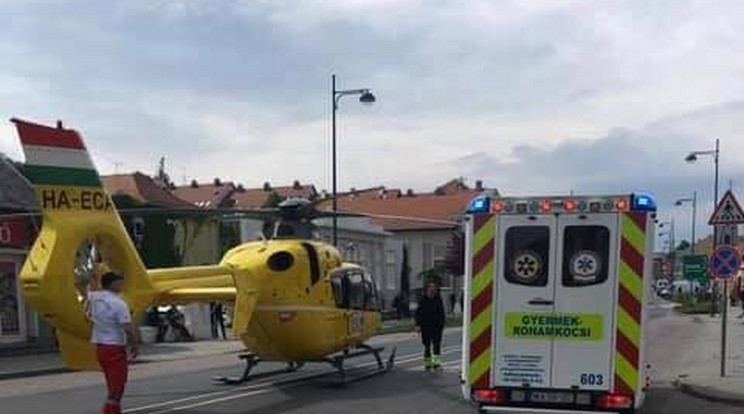 A mentőhelikopter a Bécsi úton landolt, az akció idejére az utat a rendőrök lezárták / Fotó: OMSZ Facebook
