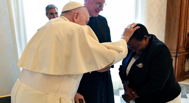 Pope Francis lays hands on Prime Minister Robinah Nabbanja