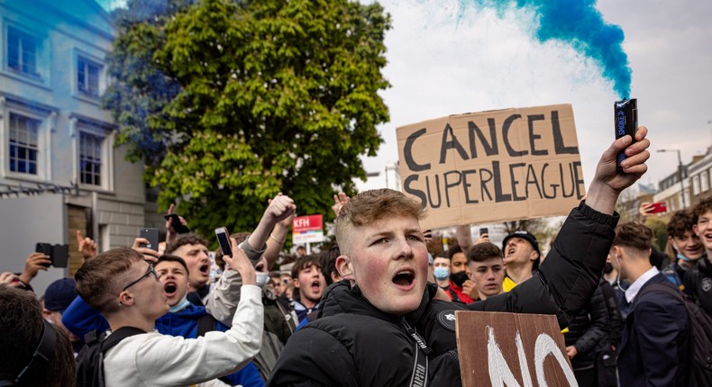 Soccer fans protest plans for a European Super League.
