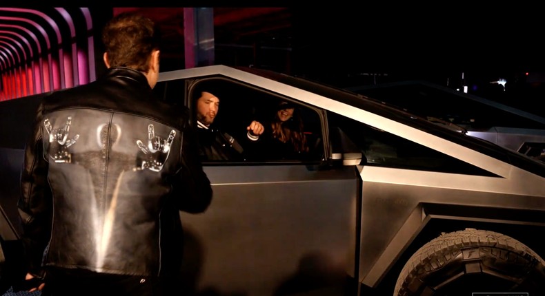 Elon Musk escorting Alexis Ohanian into his new Cybertruck. Screenshot from X of Cybertruck Delivery Event