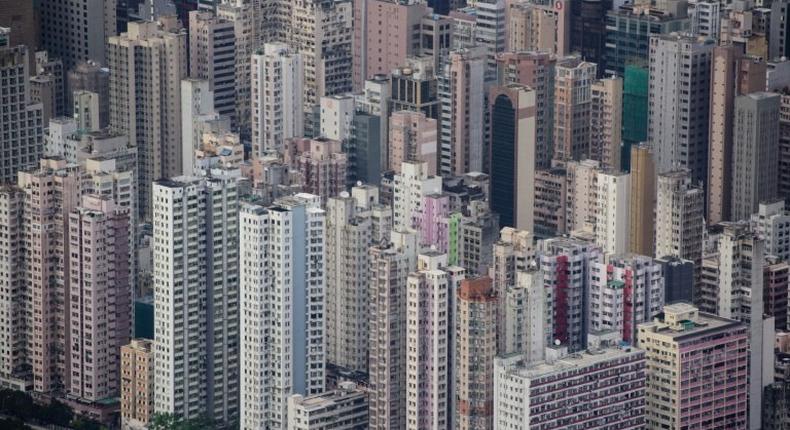 Sky-high prices and the cost of living outstrip many ordinary residents' salaries in Hong Kong, with apartments becoming increasingly cramped and generations of families forced to share