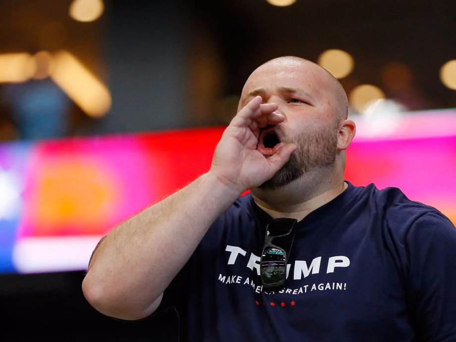 An NFL fan yelling at players during the national anthem.