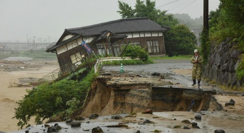 Huge floods engulfing parts of southern Japan have left hundreds stranded