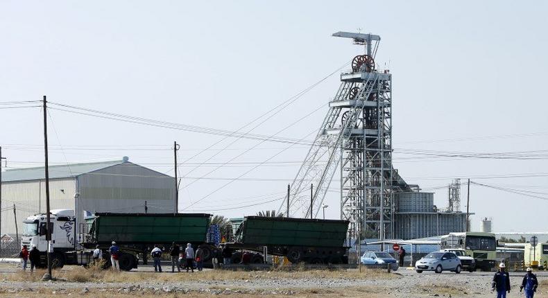 Workers leave Lonmin's Karee mine at the end of their shift, outside Rustenburg, northwest of Johannesburg July 29, 2015. REUTERS/Siphiwe Sibeko