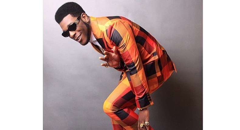 Burna Boy in Mcmeka S/S '14 'Man About Town' collection