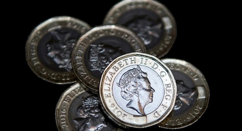 Newly issued 12-sided £1 (one pound) coins pictured in London on March 28, 2017, the day they entered UK circulation