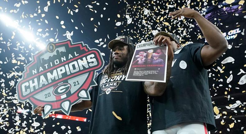 Georgia players celebrate after the College Football Playoff championship football game Tuesday, Jan. 11, 2022, in Indianapolis. Georgia won 33-18