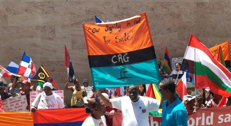 Dozens of demonstrators from the Chagos Islands protested outside the British High Commission on Mauritius