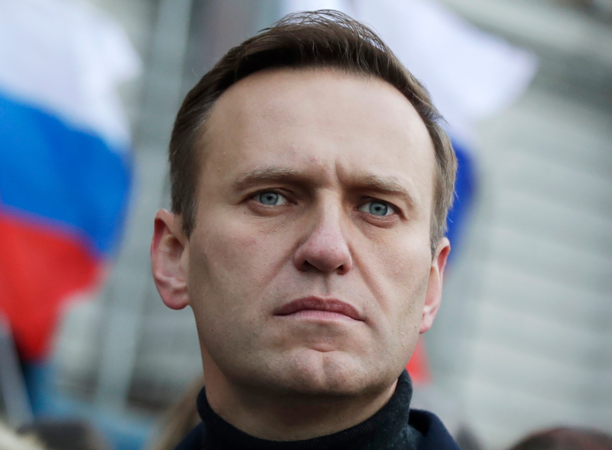 Na archívnej snímke z 29. februára 2020 ruský opozičný líder Alexej Navaľnyj počas spomienkového pochodu na pamiatku ruského opozičného lídra Borisa Nemcova v Moskve.
