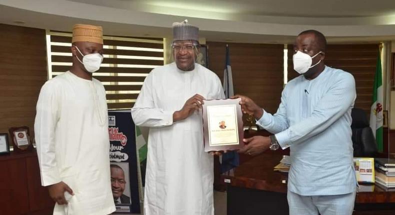 L-R: Executive Secretary, Association of Telecoms Companies of Nigeria (ATCON),  Ajibola Olude; Executive Vice Chairman/CEO, Nigerian Communications Commission (NCC),  Prof.  Umar Garba Danbatta and ATCON President,  Olusola Teniola during the presentation of the award in Abuja. 