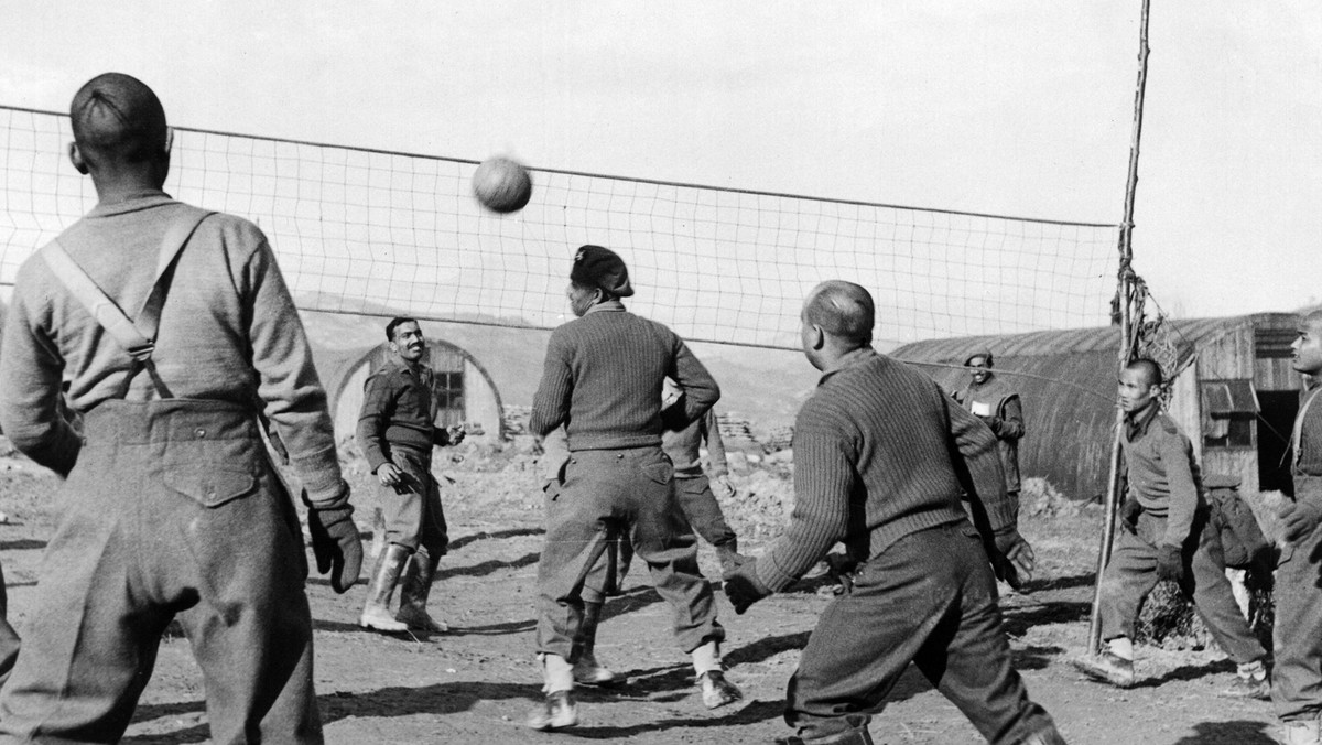 Soldiers of the Brigade of Gurkas playing volleyball