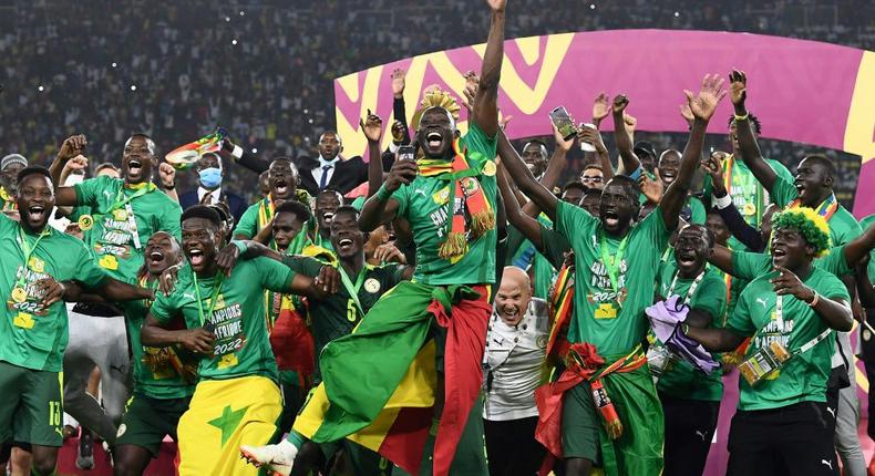 Senegal celebrate with the trophy after winning their first Africa Cup of Nations title
