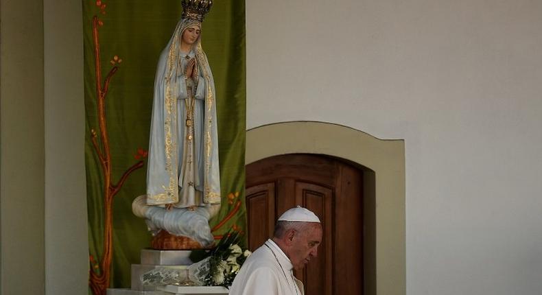 Pope Francis leads celebrations at the Our Lady of Fatima shrine to mark 100 years since three child shepherds reported apparitions of the Virgin Mary on the site