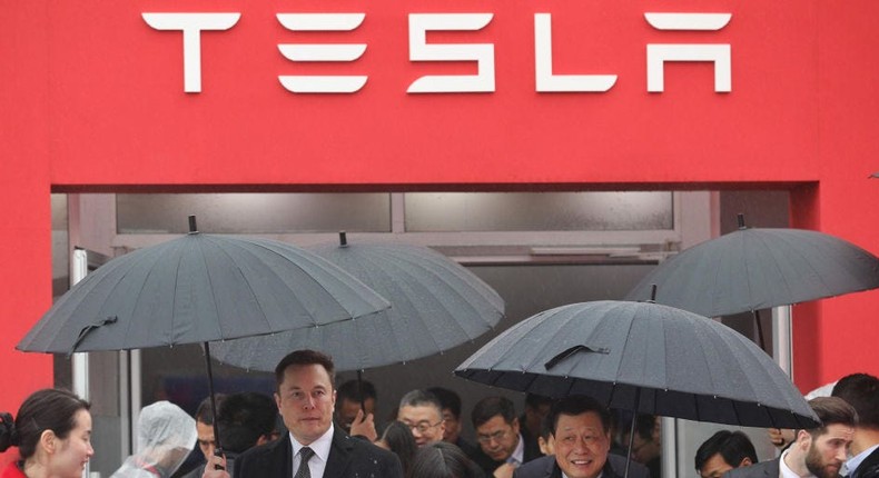 Tesla boss Elon Musk (L) walks with Shanghai Mayor Ying Yong during the ground-breaking ceremony for a Tesla factory in Shanghai on January 7, 2019.STR via Getty Images