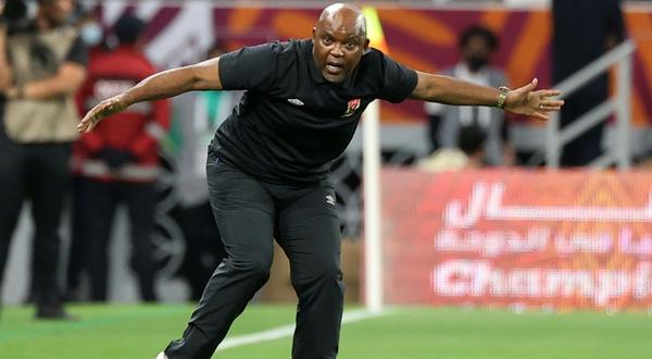 Al Ahly of Egypt coach Pitso Mosimane reacts during the CAF Super Cup match against Raja Casablanca of Morocco in Qatar on December 22. Creator: KARIM JAAFAR