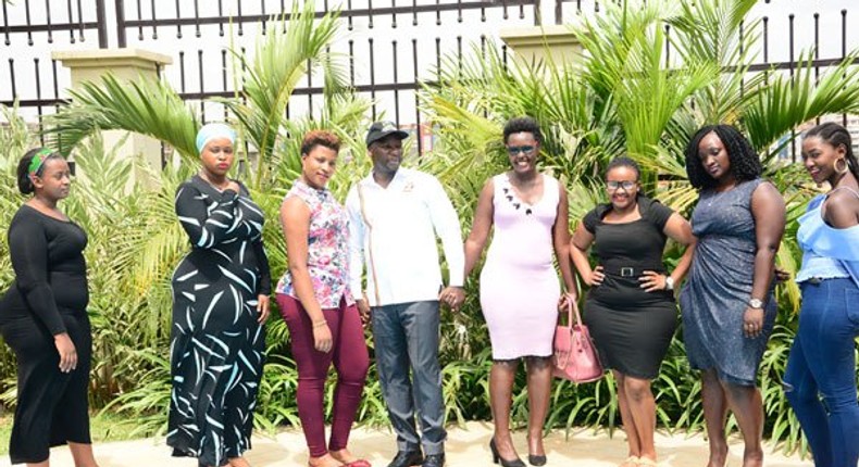 State Minister for Tourism with Ugandan models at the launch of ‘Miss Curvy Uganda’ [Godfrey Lugaaju NMG]